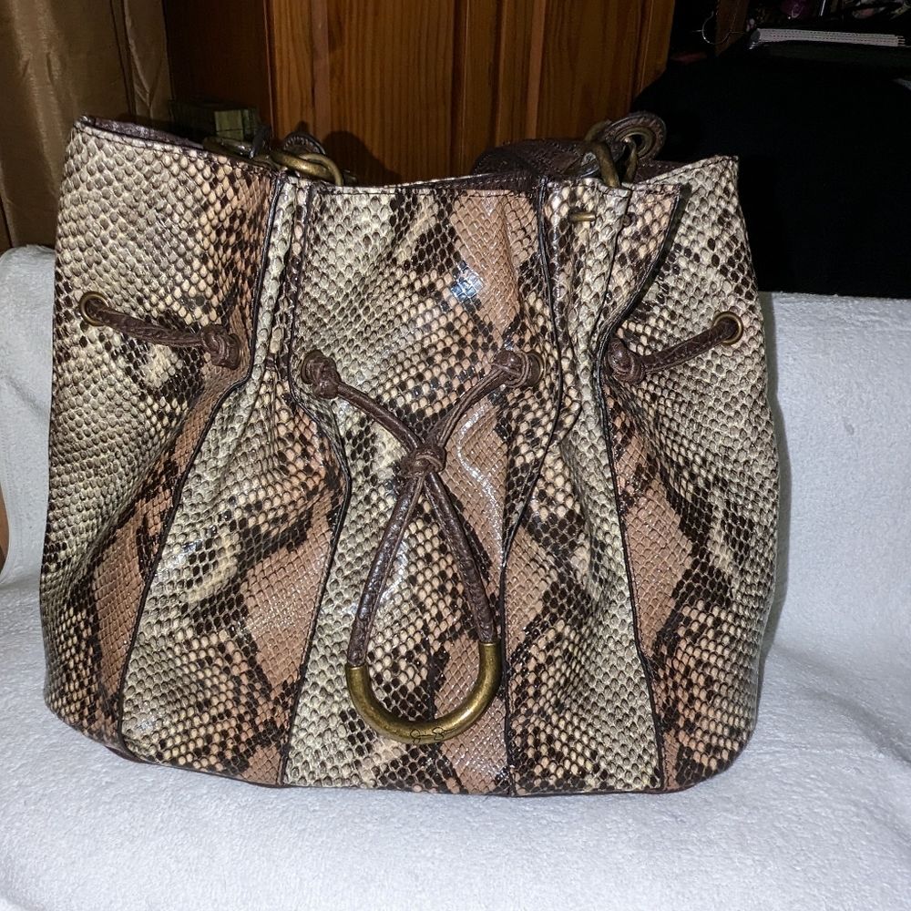 Jessica Simpson women's faux snakeskin shoulder bag.